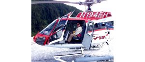 Dan explores a glacier by helicopter during his trip to Alaska
